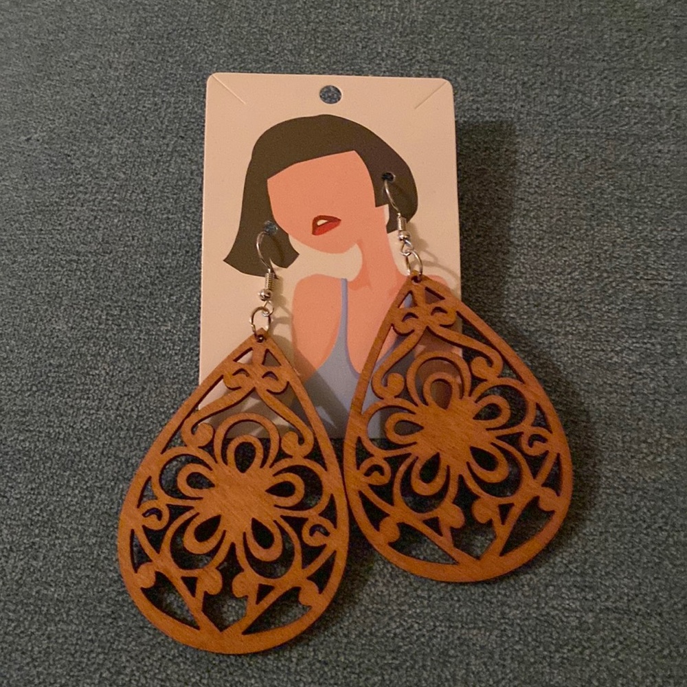 Lightweight tear drop shape laser cut wood earrings with design